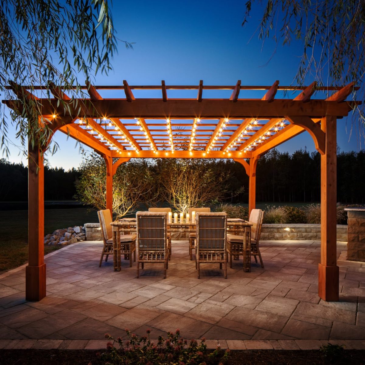 A Belgard outdoor dining room at night